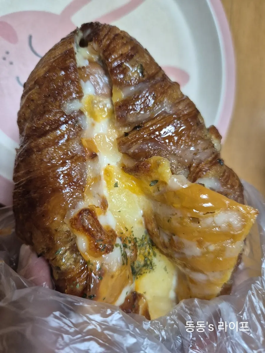 Sausage croissant with sausage baked inside