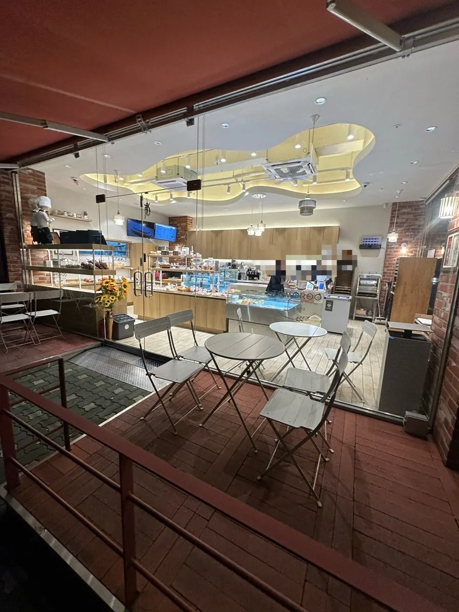 Outdoor terrace seating in front of the store