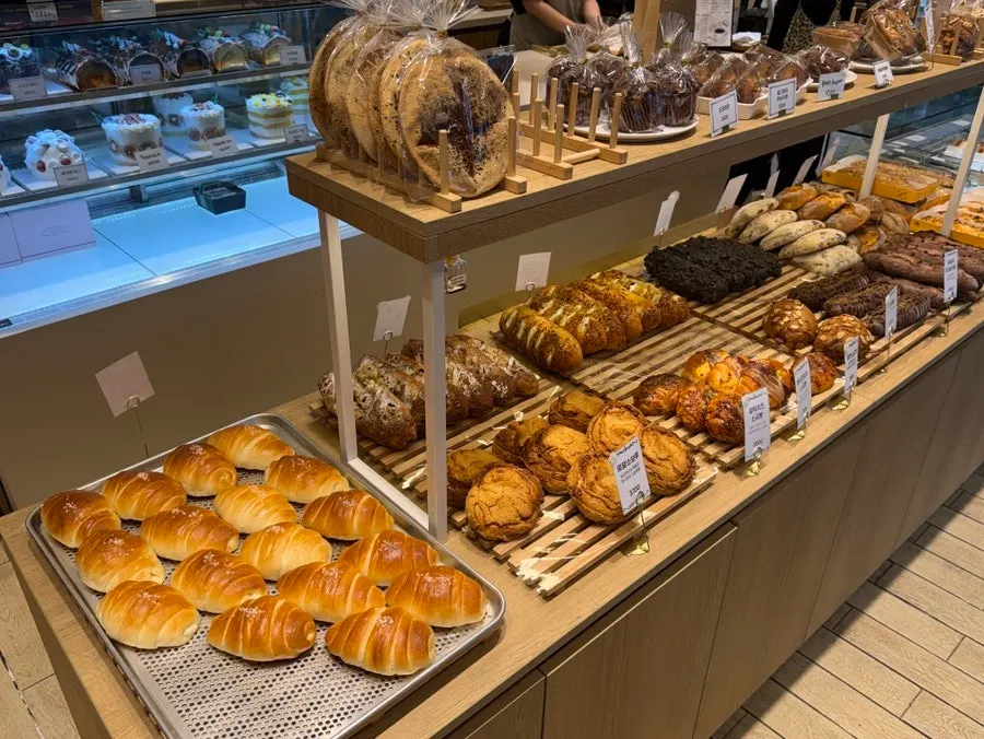 Display trays filled with various breads