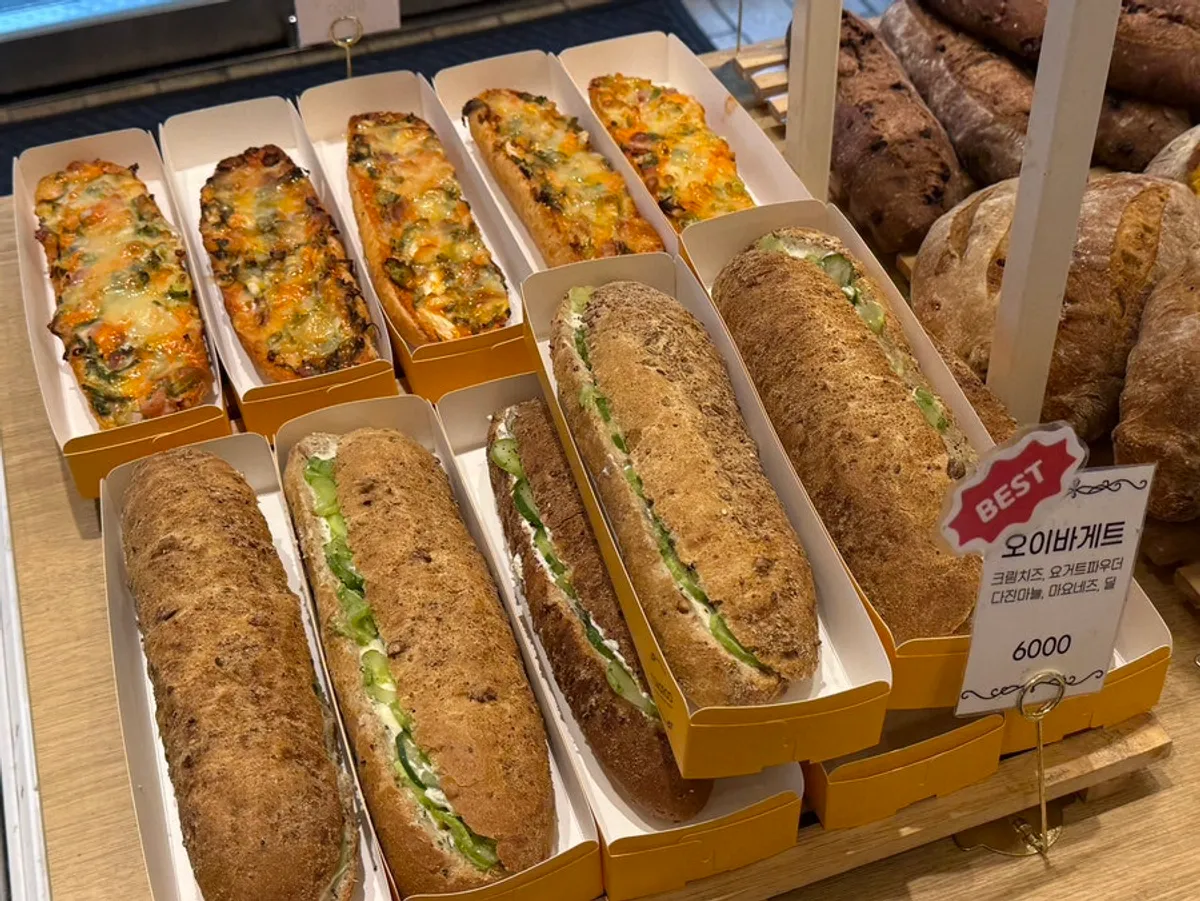Cucumber baguettes on display at Tomoru Bakery