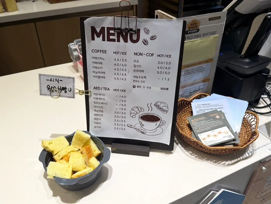 Counter with coffee menu and sample bread