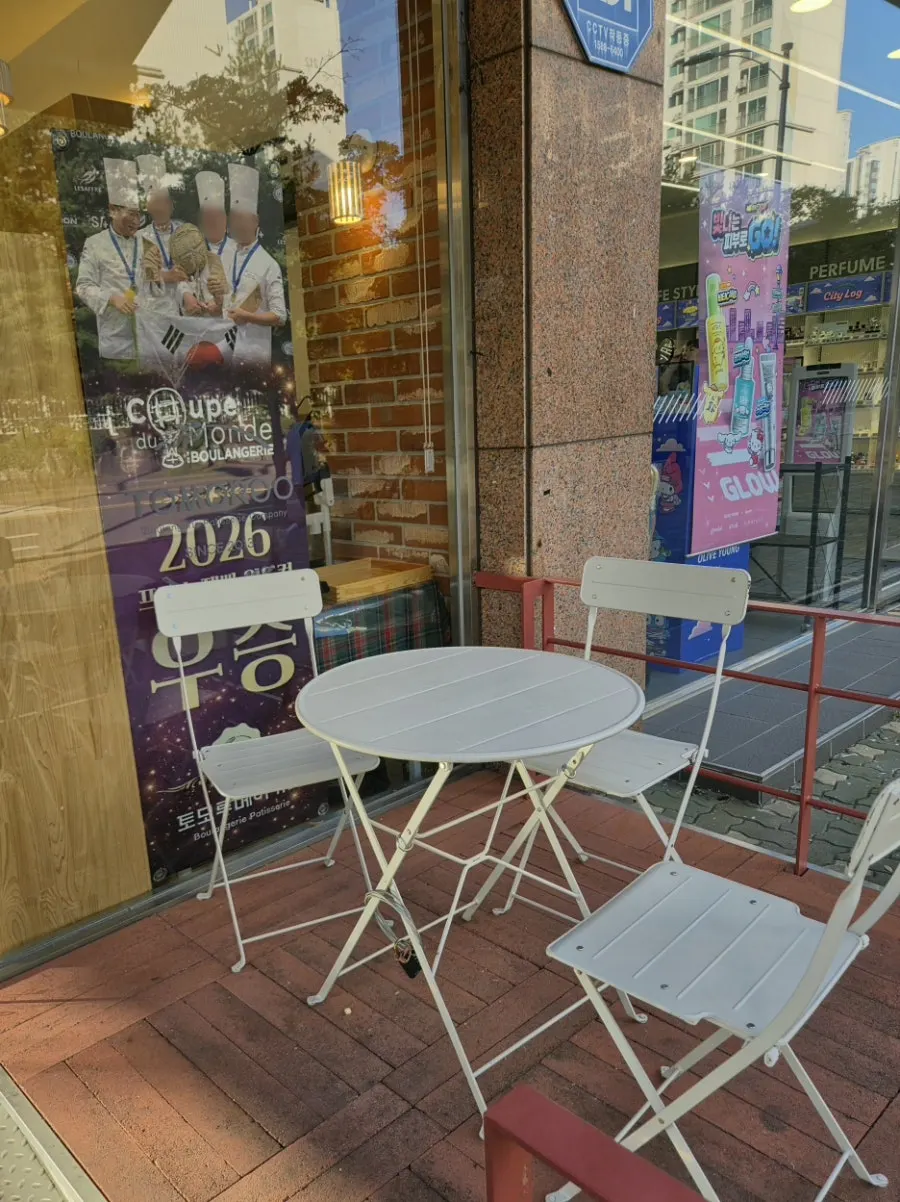 Outdoor table seating in front of the store