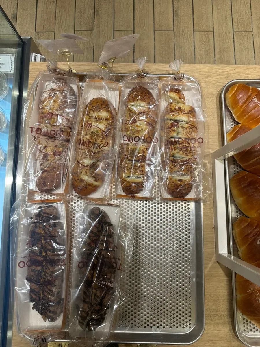 Showcase of handmade cakes topped with fruit