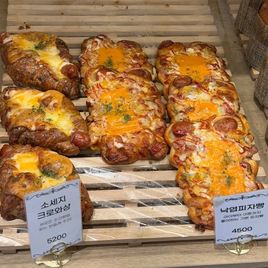 Display case with castella and sausage croissant