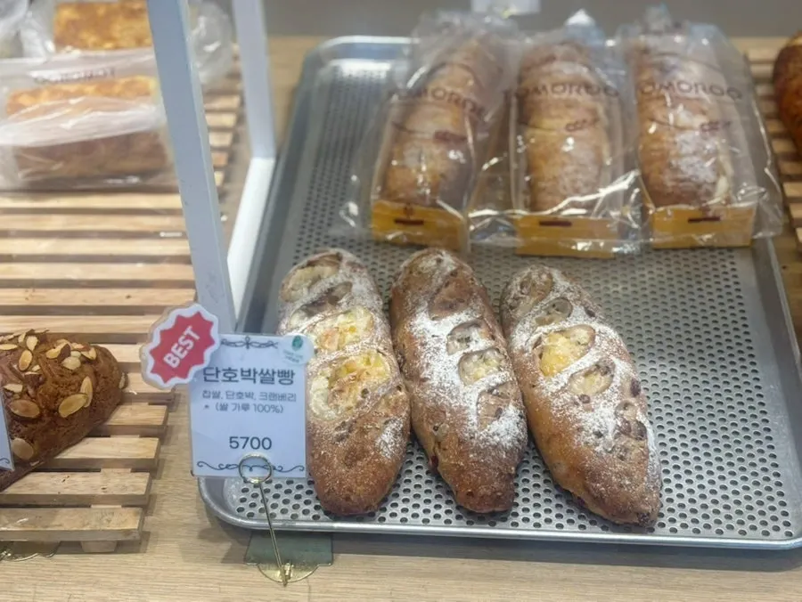 View of bread display further inside the store