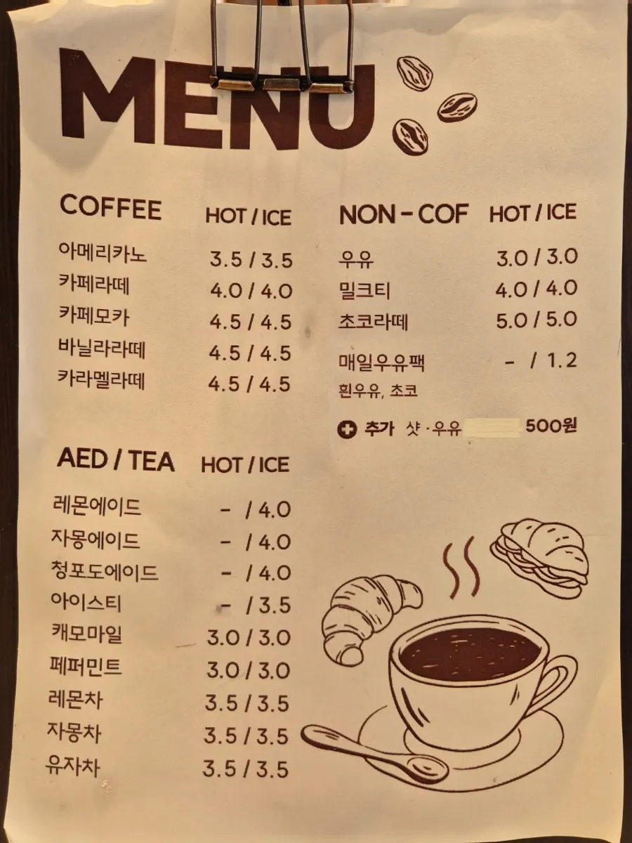 Drink menu board listing coffee, non-coffee, tea, and ade