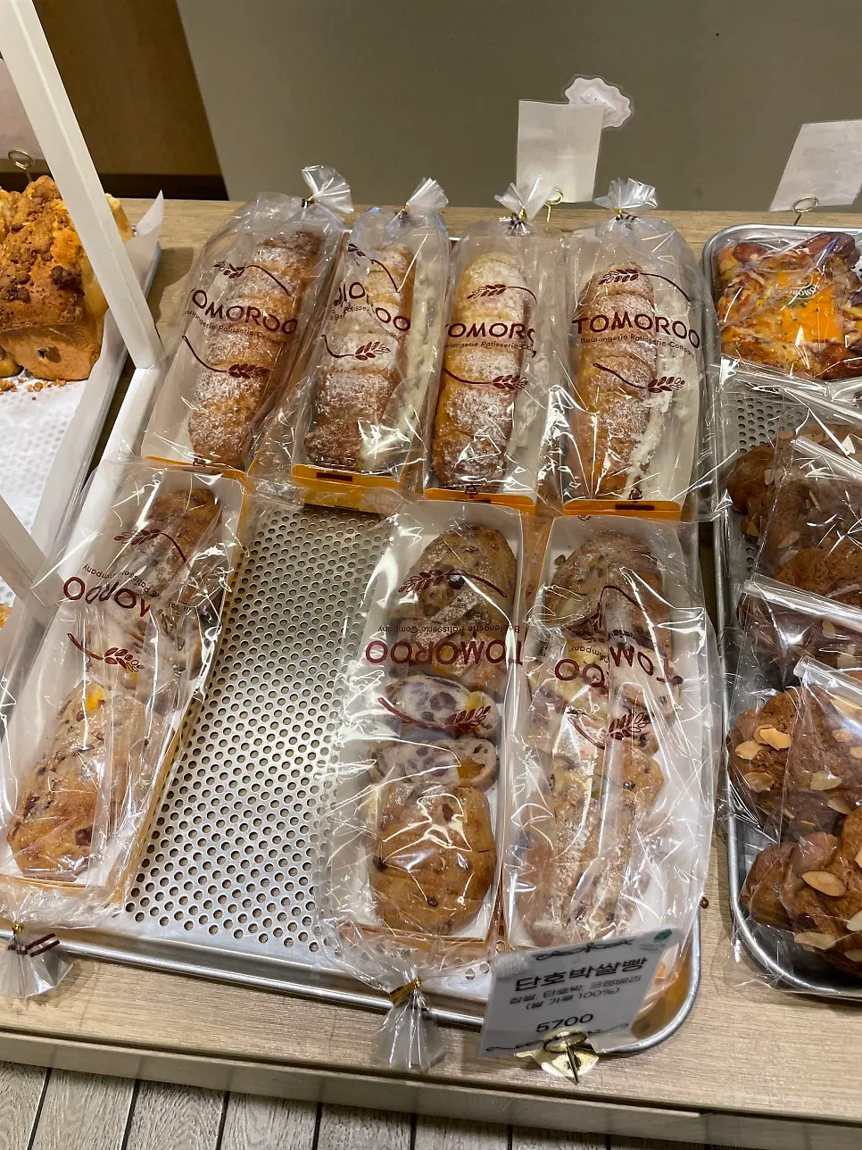 Bread section with ingredient descriptions attached
