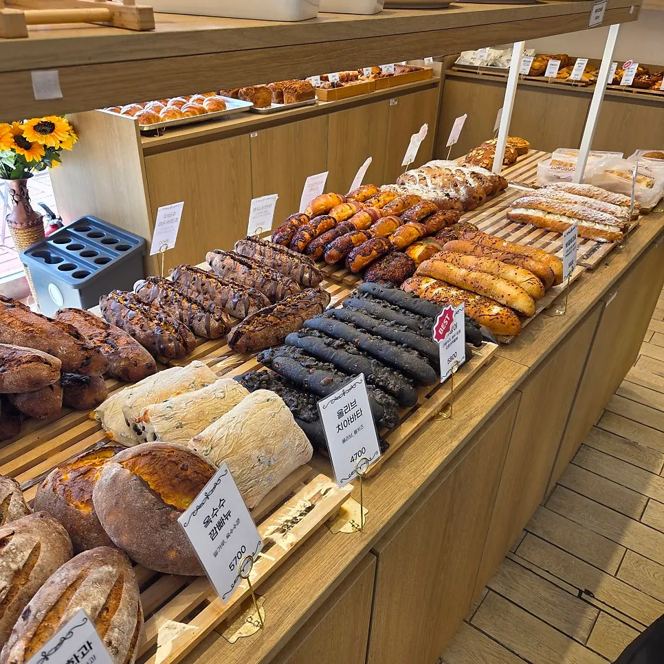 Interior of Tomoru Bakery filled with breads