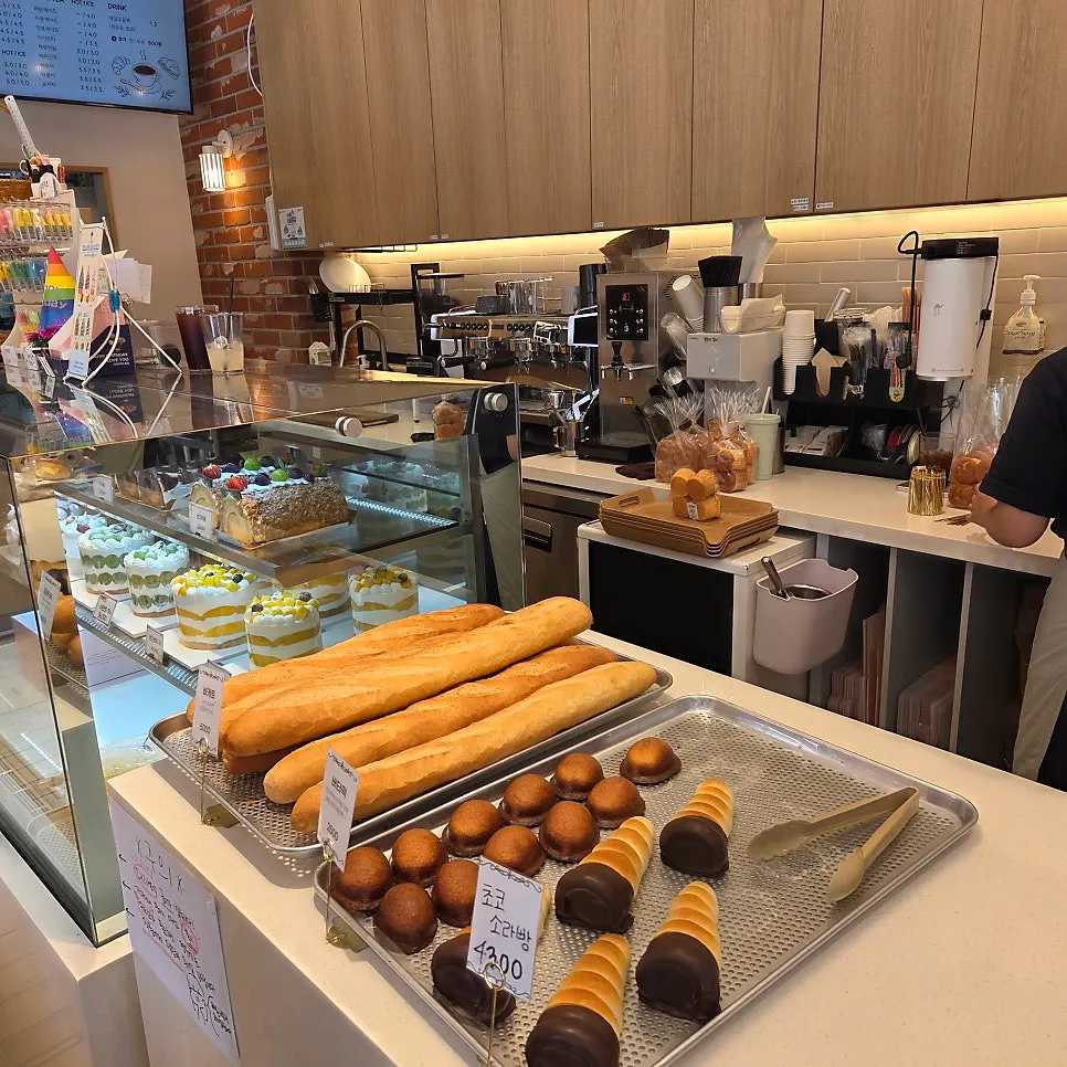 Cakes and baked snacks displayed at Tomoru Bakery
