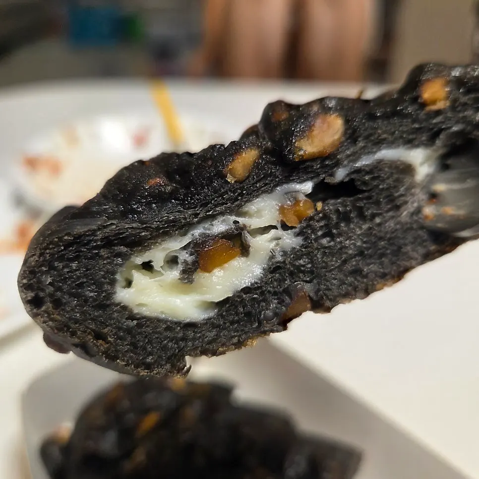 Cross-section of kkamang-i showing cream cheese filling