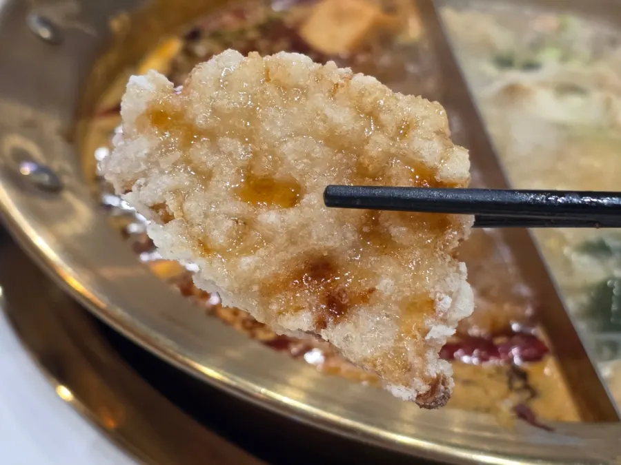Guobaorou eaten alongside the hot pot