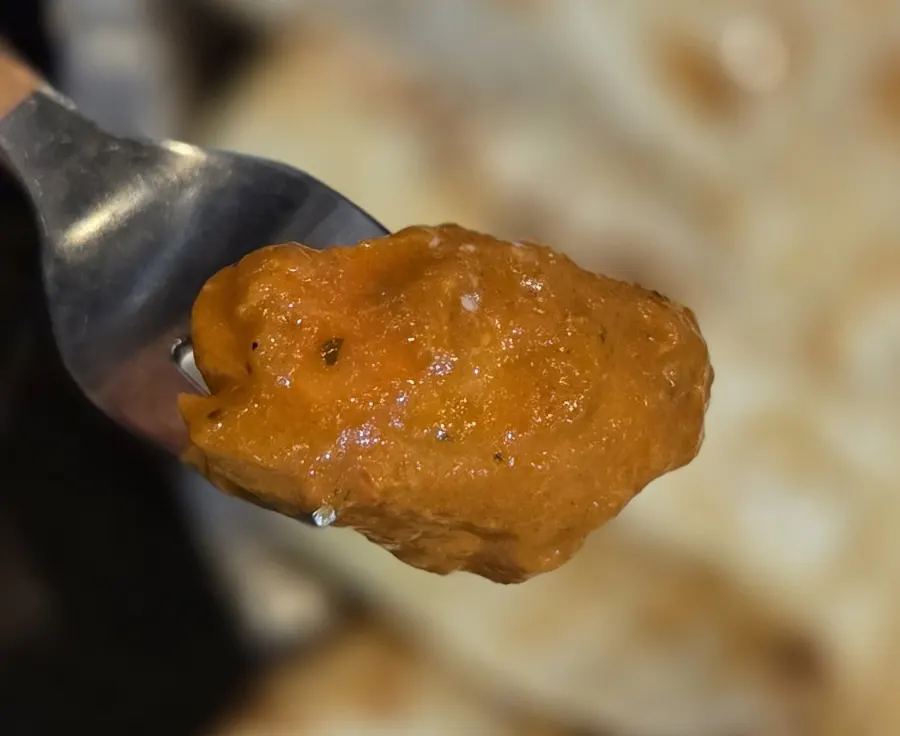 Tender chicken inside the butter chicken curry