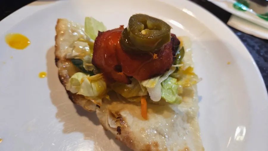 Cheese naan, tandoori chicken and green salad spread