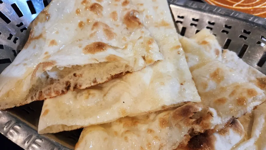 Sweet naan and cheese naan side by side