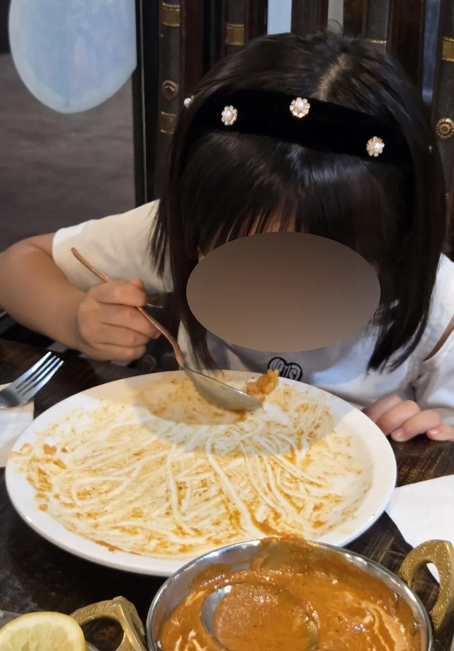 An emptied curry bowl