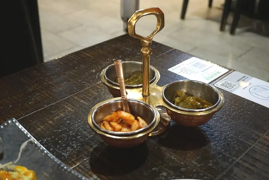 Indian food served in upscale dishware