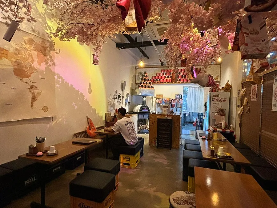 Dining hall with a large cherry blossom tree