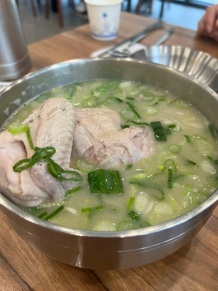 A bowl of dak kalguksu with a thicker broth from the noodles