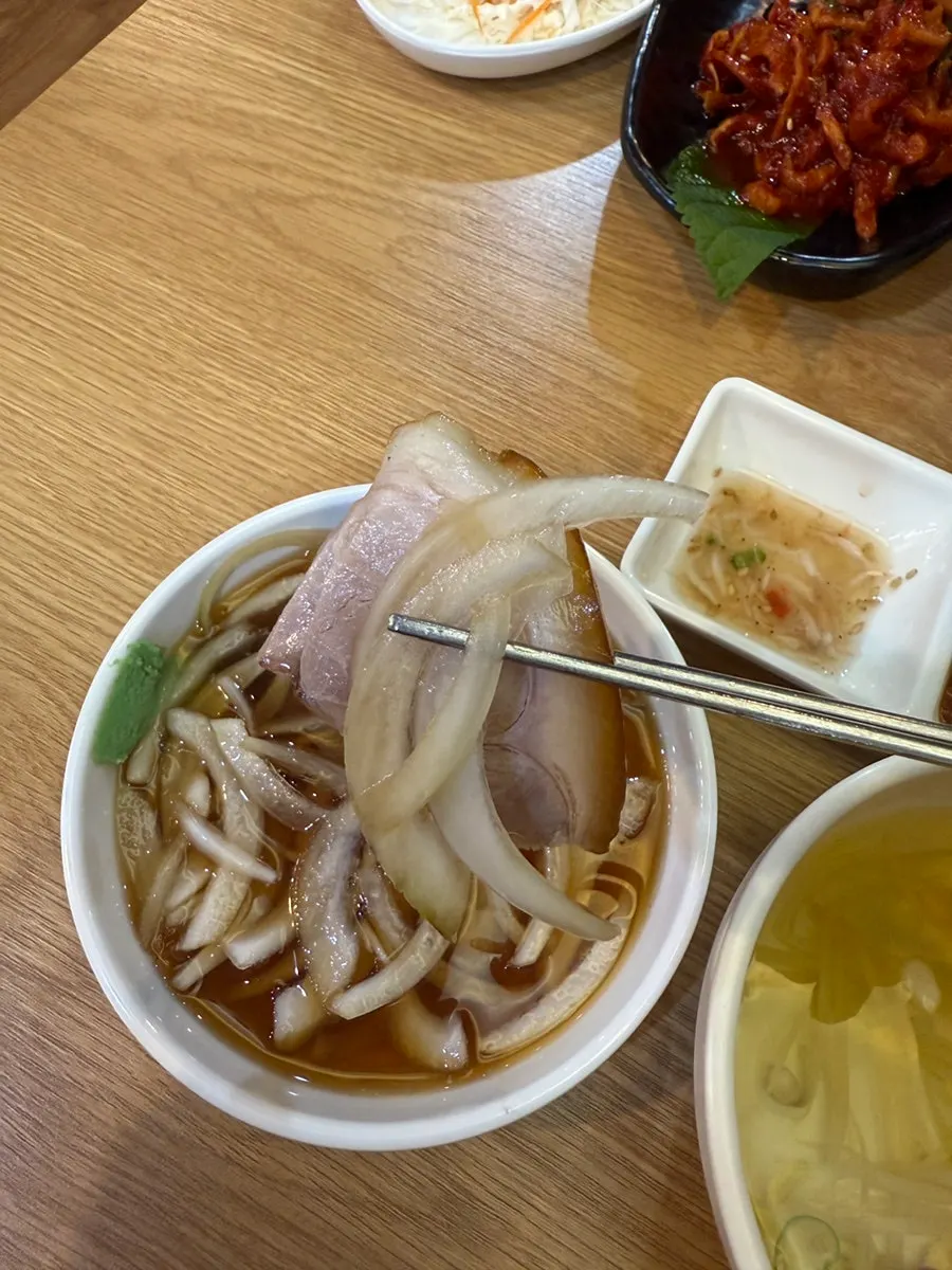 Bossam meat wrapped with kimchi on top