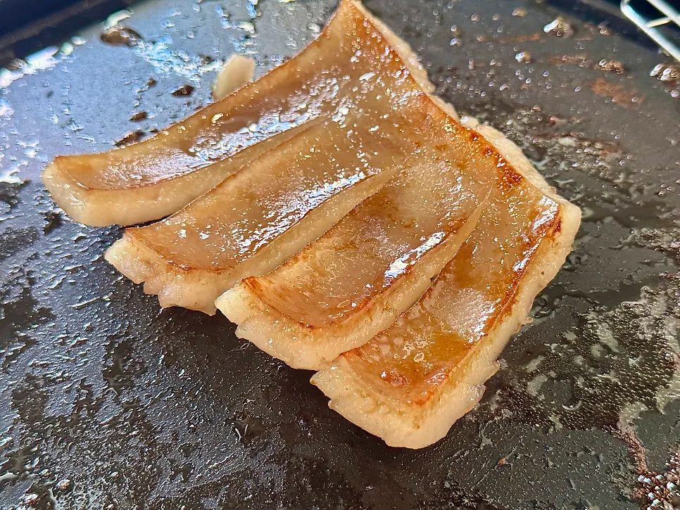 Golden, chewy grilled pork rind