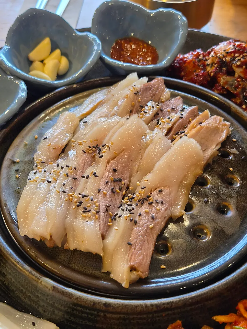 Vertical shot of the Korean set meal at Songjeongok
