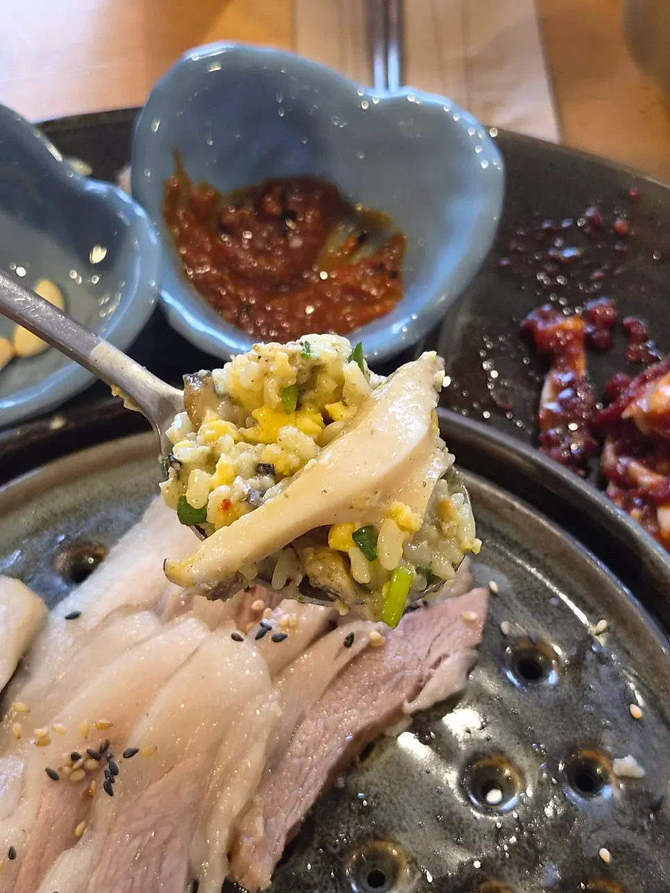 A bowl of mixed abalone pot rice from Songjeongok