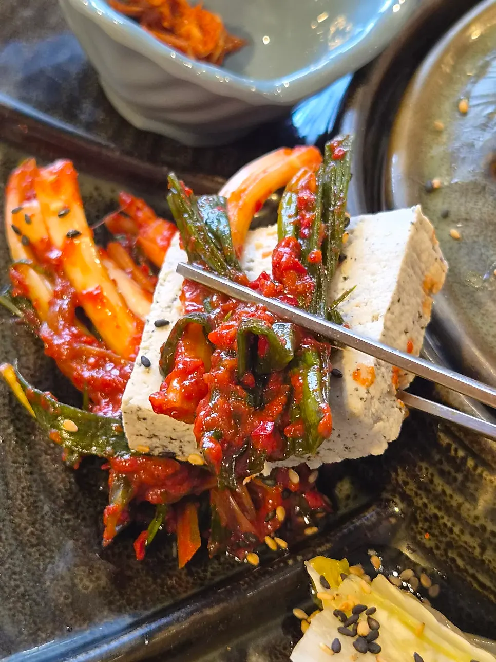 Bossam wrap with green onion kimchi