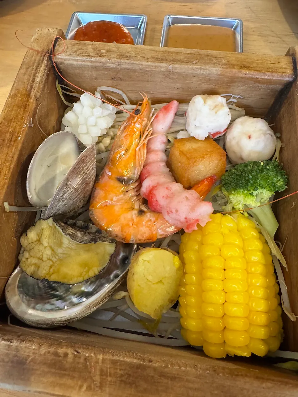 Seafood hinoki steam served one per person