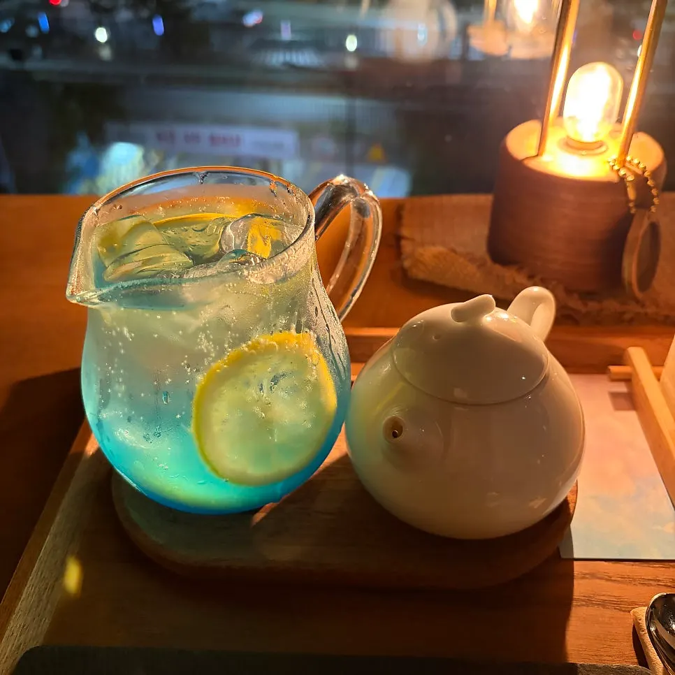 Table set with bamsimal tea and dessert