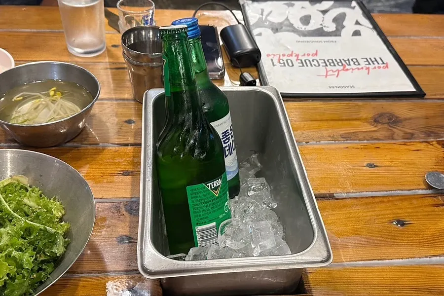 Ice bucket keeping alcoholic drinks cold