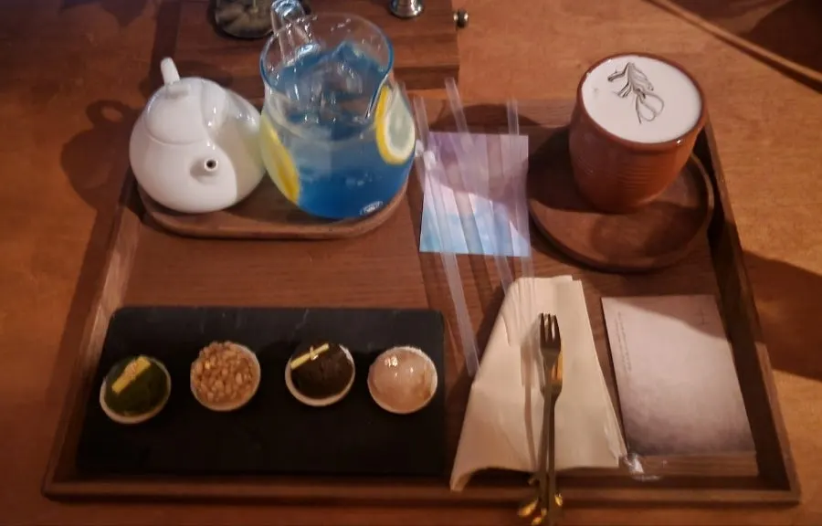 Two drinks and a plate of monaka dessert
