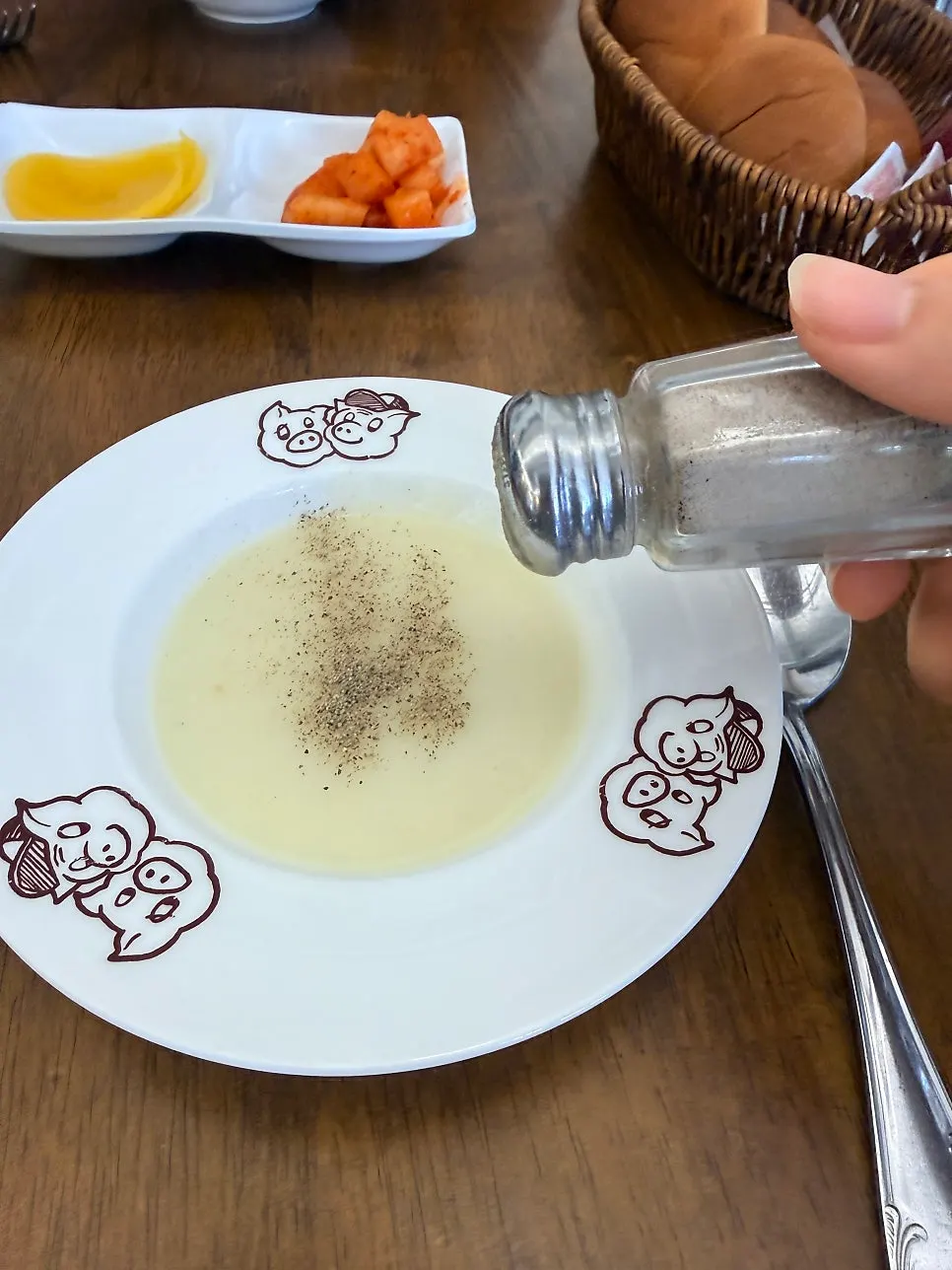 Full table setting with the large gyeongyangsik pork cutlet at Deli Donkatsu