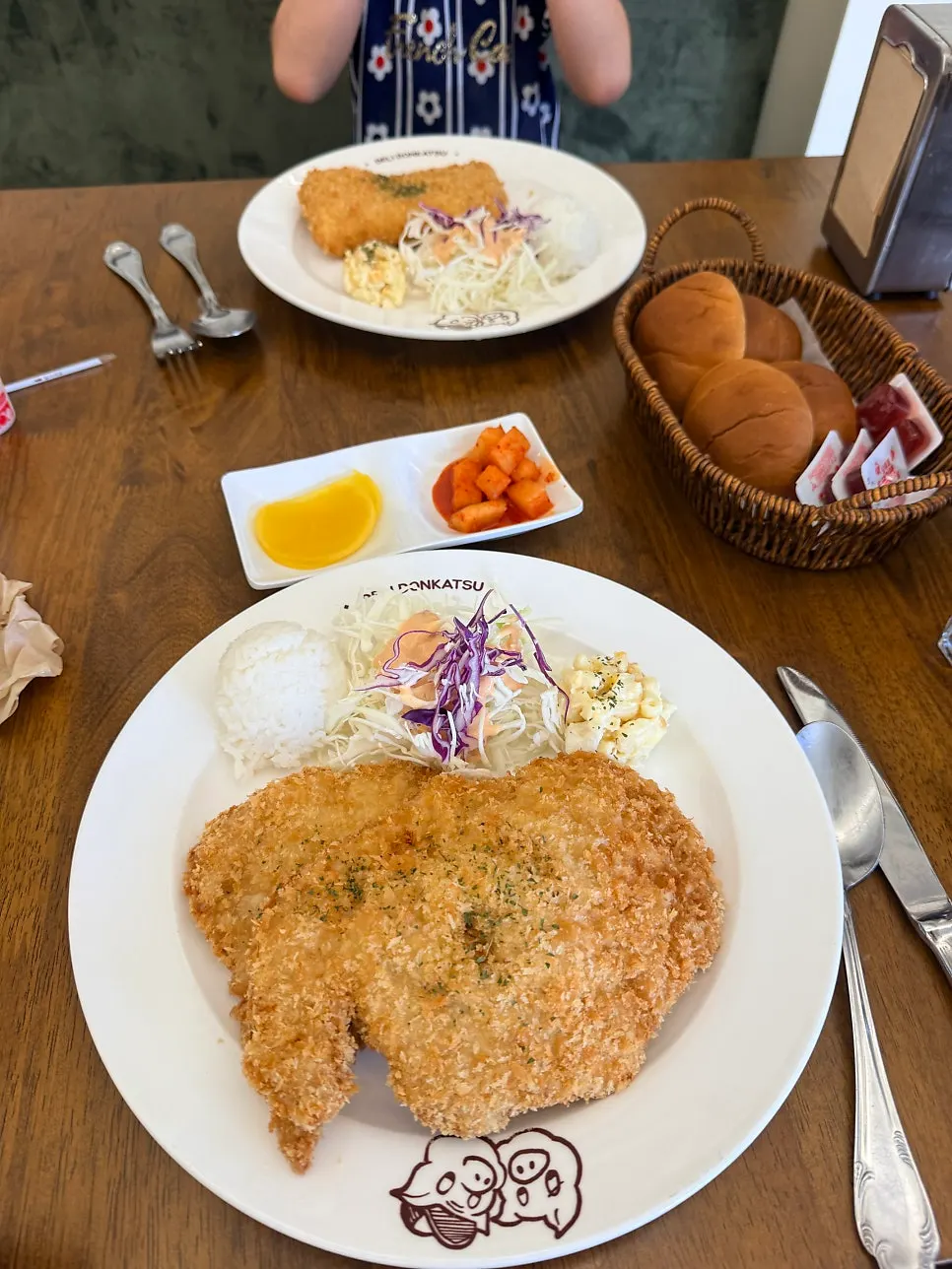 Homemade cutlet burger made with morning bread, cutlet, and salad