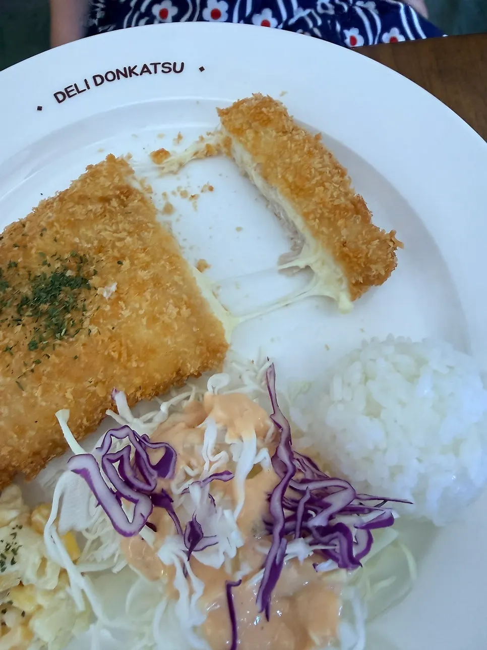 Cross-section of the cheese cutlet with stretchy mozzarella