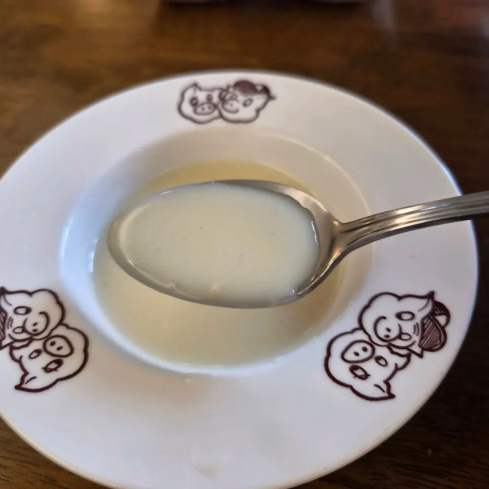 A spoonful of Deli Donkatsu's soup