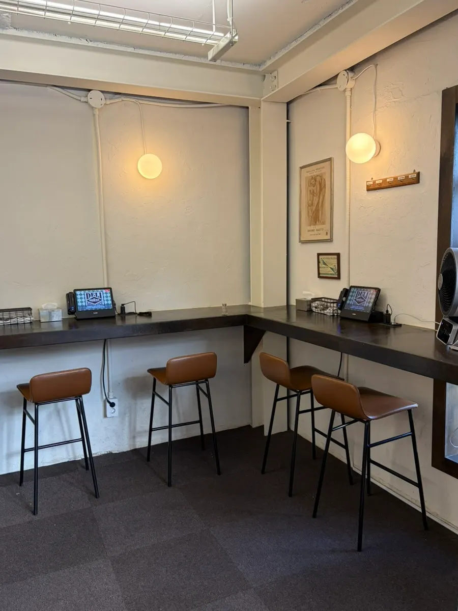Bar-style seating along the wall