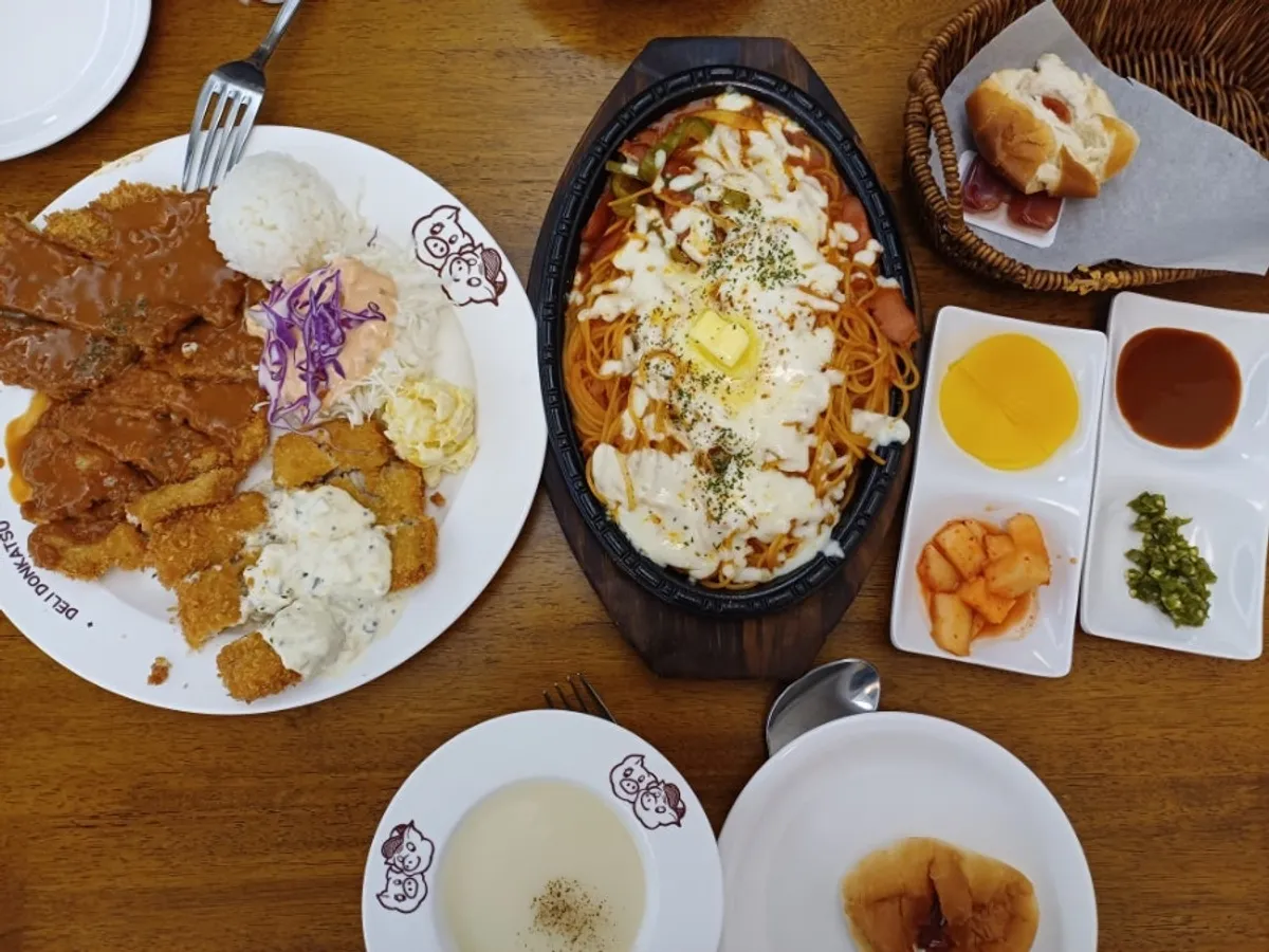 Full spread of Deli Donkatsu's Western-style pork cutlet meal