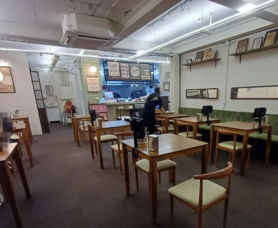 Sofa seating area inside Deli Donkatsu