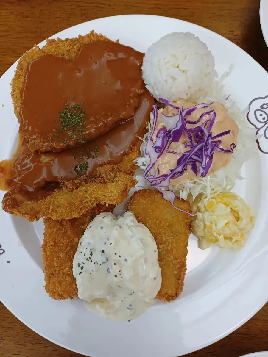 Deli Donkatsu's assorted cutlet platter piled high on a large plate