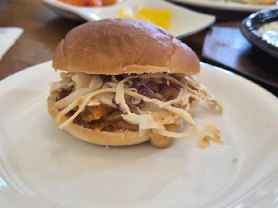 Bread topped with cheese pork cutlet and cabbage salad