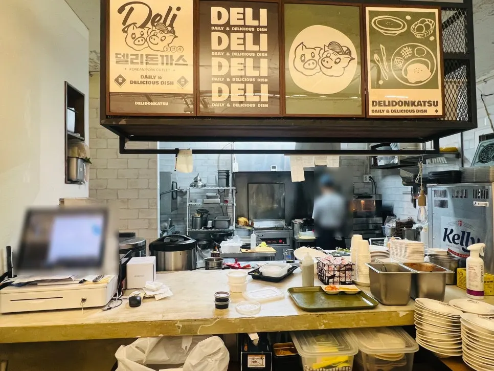 View of the first-floor seating at Deli Donkatsu