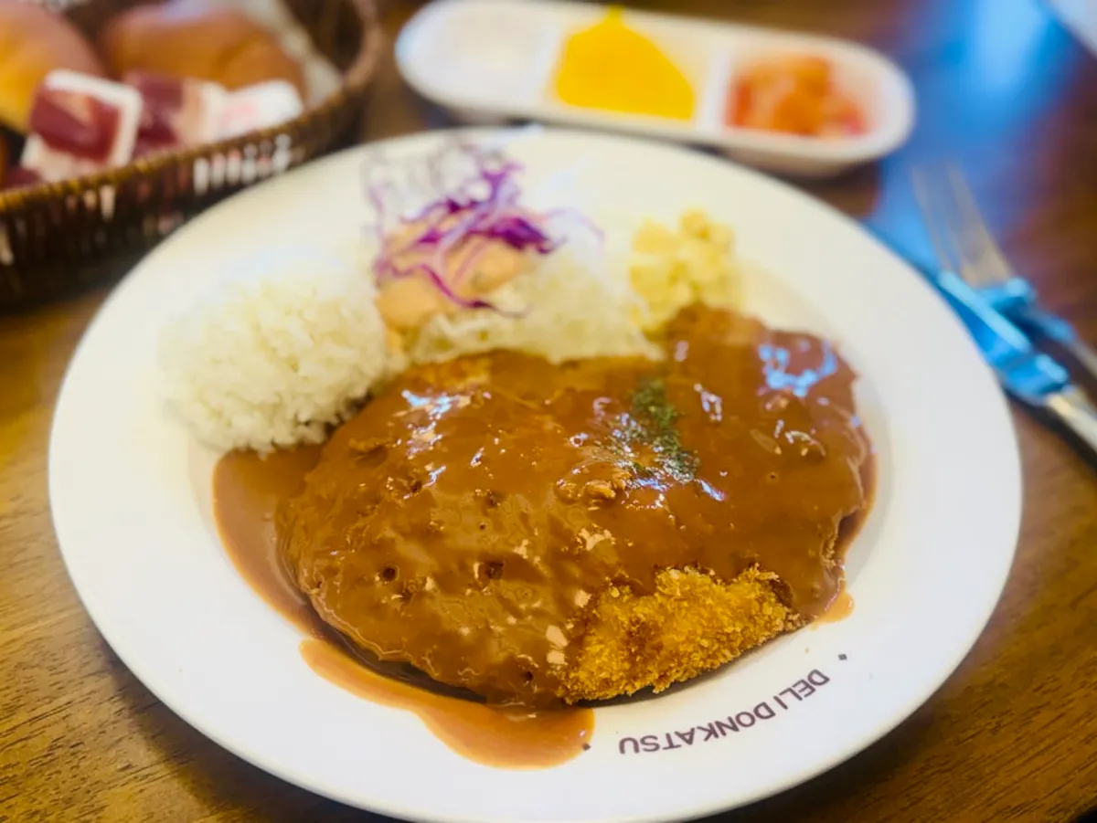 Gyeongyangsik pork cutlet set topped generously with house sauce