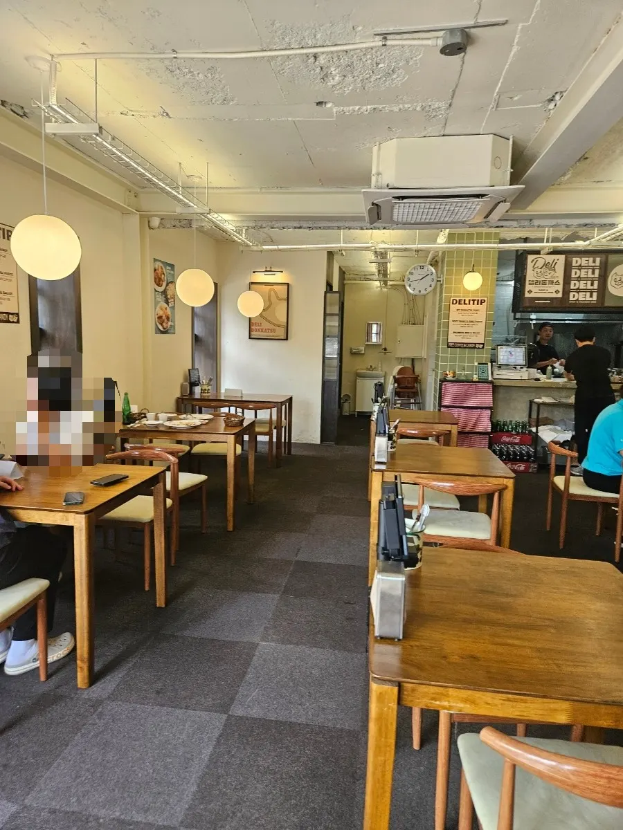 Comfortable seating area inside Deli Donkatsu