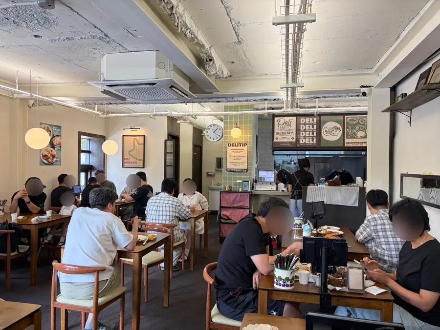 Interior of Deli Donkatsu with an old-school Korean cutlet restaurant feel