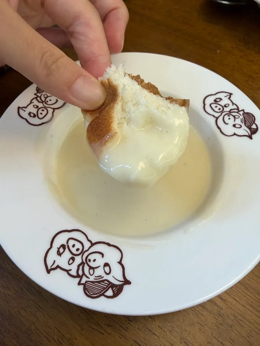 Taking a spoonful of the soup