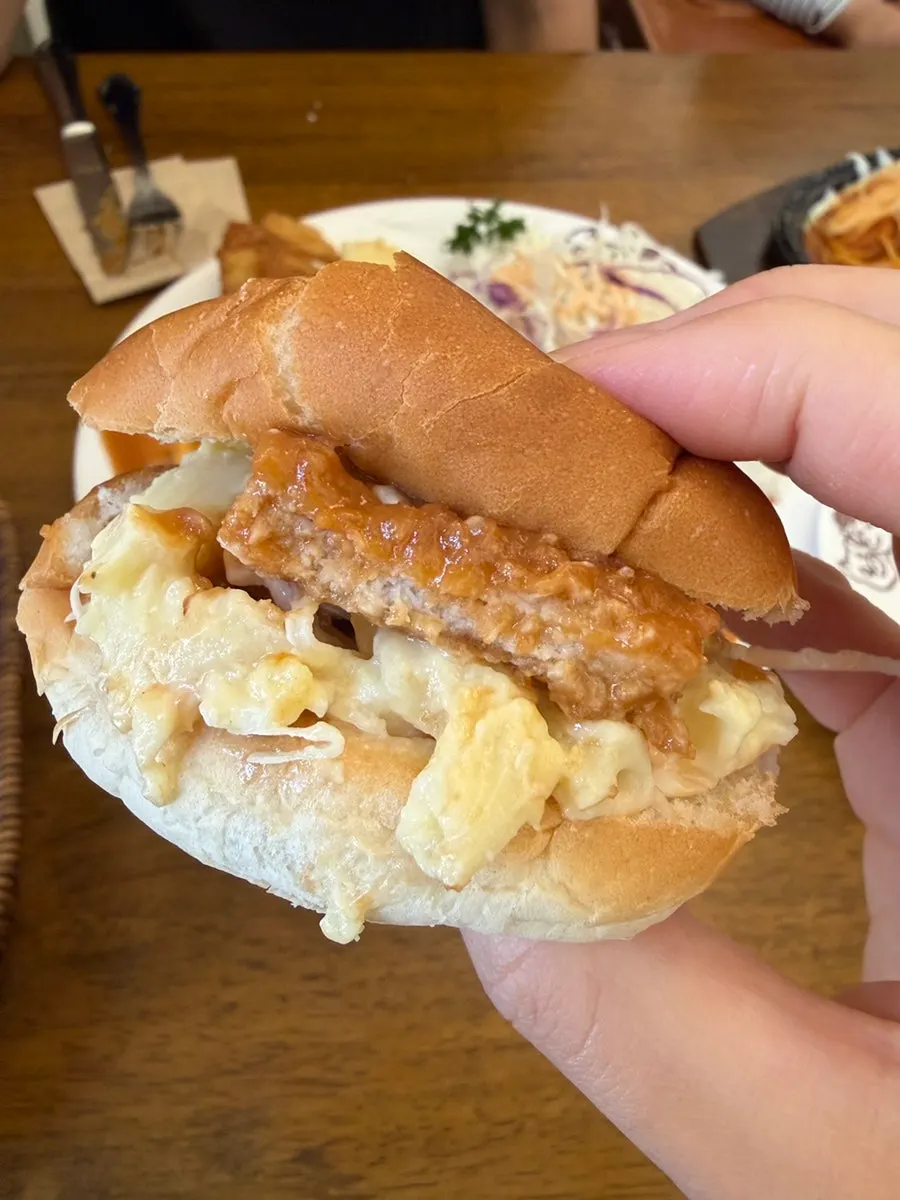 Morning roll burger stuffed with cutlet and salad