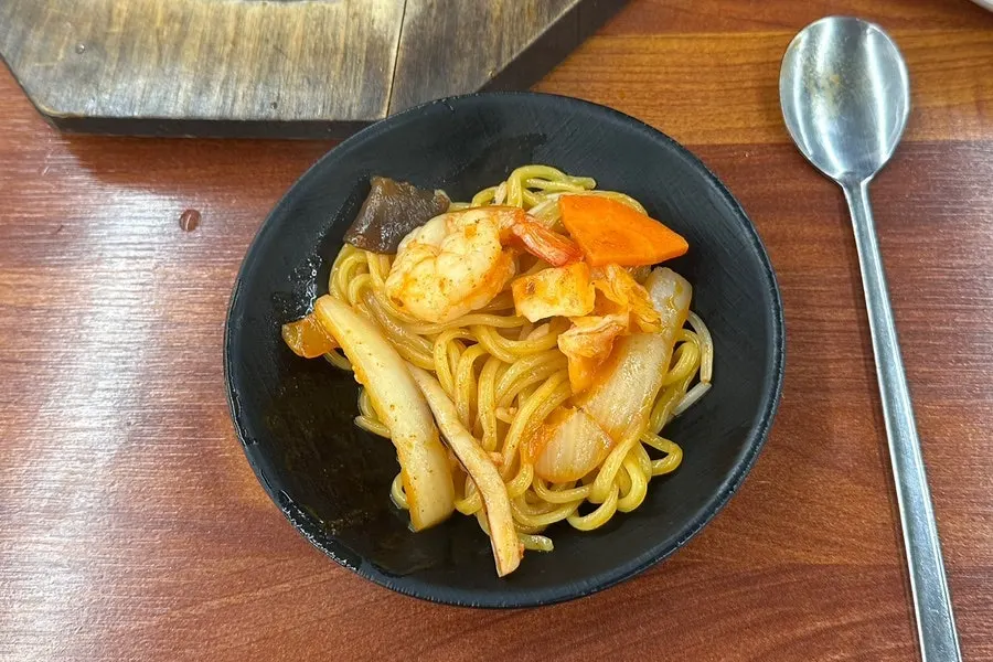 Jjamppong loaded with shrimp, squid, and other seafood