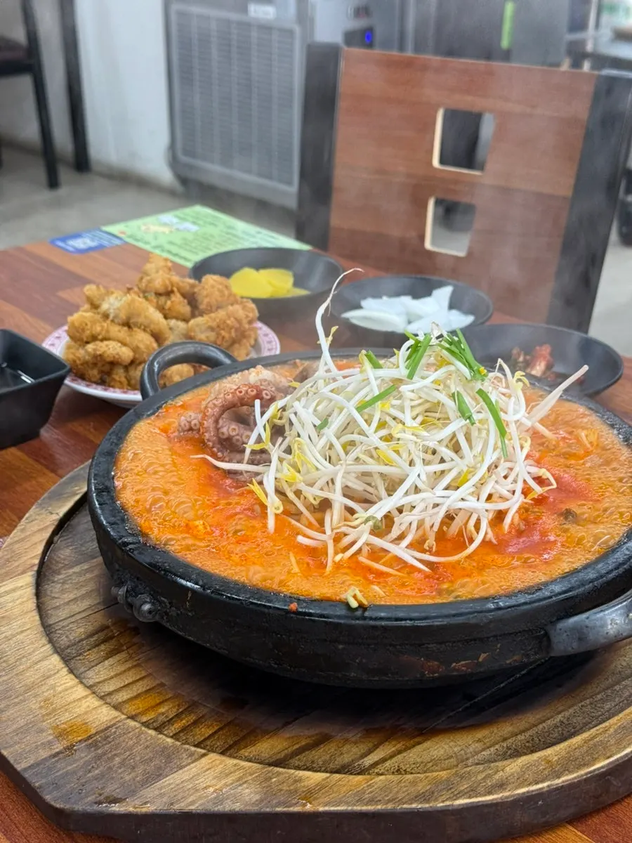 Table spread with octopus dol jjamppong medium and crunchy mini tangsuyuk