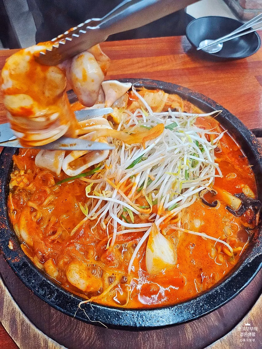 Two whole squids added on top of the jjamppong