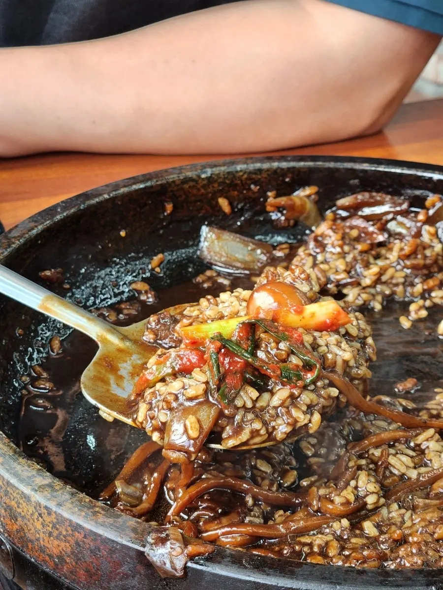 Hot stone jajangmyeon served on a stone plate